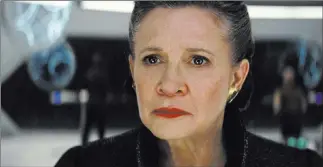  ??  ?? Carrie Fisher as General Leia in a scene from “Star Wars: The Last Jedi,” out next weekend. Lucasfilm