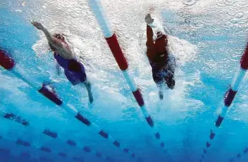  ?? Photos by Maddie Meyer / Getty Images ?? Simone Manuel, right, claimed victory in the women’s 100-meter freestyle final with a time of 54.62 seconds on Day 2 of the TYR Pro Swim Series. Abbey Weitzeil touched in second at 54.68.