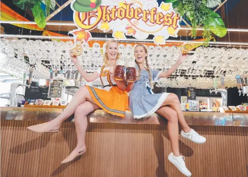  ?? Picture: RICHARD GOSLING ?? Hannah Roscoe and Jade Madeley are all set for Oktoberfes­t at The Bavarian Broadbeach.