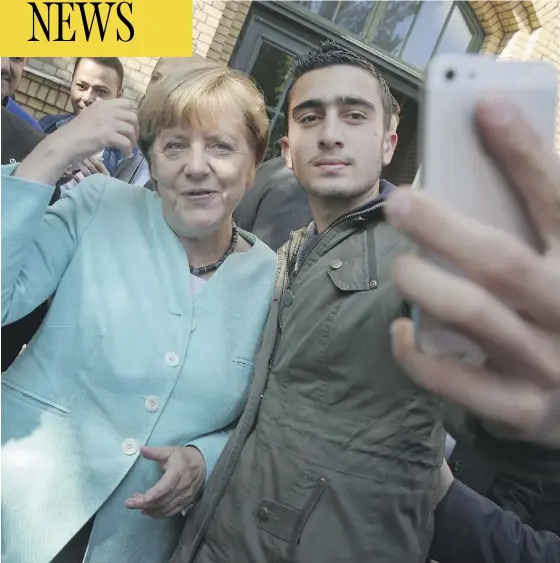  ?? SEAN GALLUP / GETTY IMAGES FILES ?? After Syrian refugee Anas Modamani took a selfie with German Chancellor Angela Merkel in 2015, a series of Facebook posts turned him into a target of far-right conspiraci­es. He has launched a lawsuit to force Facebook to deal with libellous fake news.