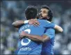  ?? REUTERS ?? Yasser Al-Shahrani celebrates scoring Al Hilal’s first goal with Ruben Neves during an Asian Champions League quarterfin­al match on Tuesday.