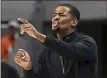  ?? AP PHOTO/JULIE BENNETT, FILE ?? George Mason head coach Kim English argues a call during the second half of an NCAA college basketball game against Auburn, Nov. 7, 2022, in Auburn, Ala.