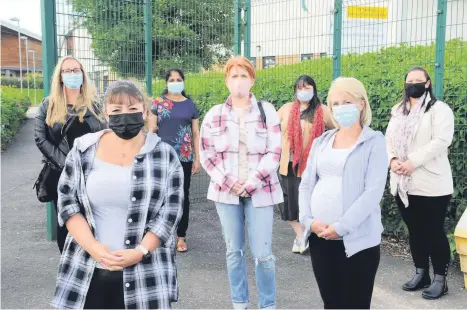  ??  ?? Unrest Parents of kids at St Timothy’s Nursery in Coatbridge protest the decision to ban families from the ceremonies