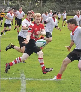  ?? 01_B38rugby04 ?? Jack McNally intercepts a Birkmyre pass to claim possession of the ball.