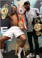  ??  ?? BELTER: With Floyd Mayweather