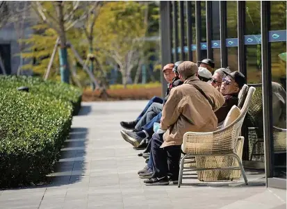  ?? Photo: Reuters ?? Elderly visitors enjoy the sunshine, at a nursing home of Lendlease’s Ardor Gardens in Shanghai, China February 27, 2023.