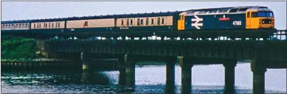  ?? ?? on the right lines: A British Rail passenger train crosses the River Stour at Manningtre­e, Essex in 1982