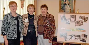  ?? News-herald photo — DEBBY HIGH ?? CELEBRATIN­G VOLUNTEERS ... Linda Gross, of Grand View Hospital’s chaplaincy program; Caroll Clymer, manager of the hospital’s volunteer services; and Eileen Landes, who received the 2012 Maybelle Peters Award, gather together during Grand View...
