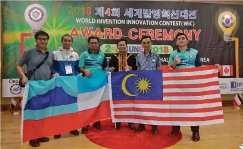  ??  ?? Mohd Sirhajwan Idek (second from right) with the other winners (from left) Michael Dungki, Terrence Fong, Sadzul Hamzasin, Saumon Maliki and Azley Jalday from Keningau Vocational College at the World Invention Innovation Contest in Seoul.