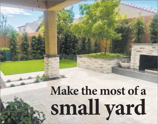  ?? Land View Landscape Services ?? This small yard has it all: entertaini­ng area, decorative wall fireplace and green space.