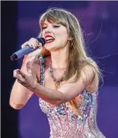  ?? SHANNA MADISON / CHICAGO TRIBUNE / TNS ?? Taylor Swift performs at Soldier Field in Chicago on June 2, 2023.