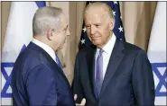  ?? ASSOCIATED PRESS FILE PHOTO ?? Israeli Prime Minister Benjamin Netanyahu, left, and then-Vice President Joe Biden talk prior to a meeting on the sidelines of the World Economic Forum in Davos, Switzerlan­d, on Jan. 21, 2016.