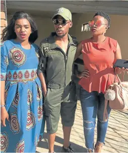  ?? / Supplied ?? Baroka midfielder Mduduzi Mdantsane at home with his aunts Portia, left, and Sharon Mbonani.