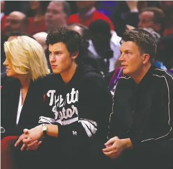  ?? GREGORY SHAMUS/GETTY IMAGES ?? Justin Stirling, right, was named head of marketing for AG Artists, whose star client is Shawn Mendes, left. Stirling says it’s his dream job and the Ottawa show this weekend will be special.