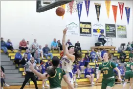  ?? Photo by Becky Polaski ?? Molly Hanslovan, 2, scores the first points of the second half 40 seconds into the third quarter in Wednesday’s game against Blackhawk.