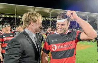  ?? PHOTO: KAI SCHWOERER/GETTY IMAGES ?? Former Canterbury coach Scott Robertson, now in charge of the Crusaders, and captain Luke Whitelock celebrate winning a 13th NPC title at AMI Stadium last year.