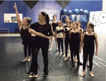  ?? Miami Dance Project ?? Barbara Delgado works with special needs students in her studio. Trained in Autism Movement Therapy, Delgado, executive director of the Miami Dance Project, teaches dance to students on the autism spectrum.