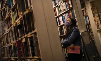  ?? Photograph: Francisco Seco/AP ?? Losing the carapace of self ... a woman browses in a Brussels bookshop.