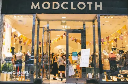  ?? Kim Chandler ?? In recent years, ModCloth has opened temporary pop-up shops across the country, including one in Pittsburgh and the one shown here in Denver. The company, which has been acquired by Wal-Mart’s Jet.com, has one permanent store in Austin, Texas.