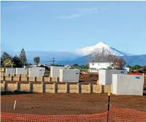  ?? DEBBIE JAMIESON/STUFF ?? A KiwiBuild developmen­t under way in Taranaki. The Government’s flagship policy is due for a reset in the coming months.