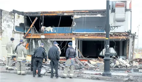  ?? ALISON LANGLEY/POSTMEDIA NEWS ?? The cause of a fire that destroyed a vacant building on Ferry Street in Niagara Falls is under investigat­ion.