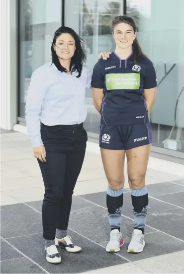  ??  ?? Gemma Fay, left, with Helen Nelson as they unveil Scotland Women’s new shirt sponsor, SP Energy.