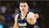  ?? David Zalubowski / Associated Press ?? Denver Nuggets center Nikola Jokic agreed to a supermax extension to remain with the Denver Nuggets.