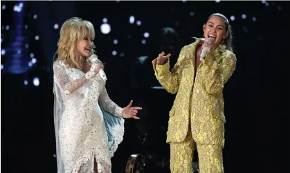  ?? Photograph: Kevork Djansezian/Getty Images ?? Melissa Tempel believes she was punished because the song by Miley Cyrus and Dolly Parton references rainbows, a key LGBTQ+ symbol.