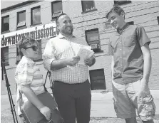  ?? NICK BRANCACCIO ?? Ward 3 Coun. Reno Bortolin talks with his sons Wilson, left, and Charlie on Wednesday after launching his re-election campaign outside the Downtown Mission.