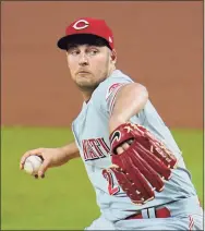  ?? Gene J. Puskar / Associated Press ?? Reds starting pitcher Trevor Bauer delivers during a game against the Pirates on Sept. 4.