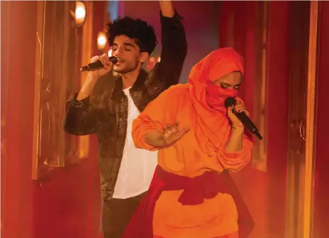  ?? ?? Clockwise from top, Eva B, right, and Kaifi Khalil sing ‘Kana Yaari’; Abdullah Siddiqui, left, and Atif Aslam performed ‘Go’; and Abida Parveen’s ‘Tu Jhoom’