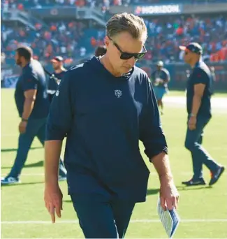  ?? EILEEN T. MESLAR/CHICAGO TRIBUNE ?? Bears coach Matt Eberflus walks off the field after a 31-28 loss to the Broncos on Oct. 1 at Soldier Field.