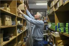  ?? Steve Mellon/Post-Gazette ?? John Capaccio, a supplier of leather and other shoe-repair items to cobblers, at his Uptown shop, Fort Pitt Leather Co., on March 6. His great-uncle started the business in 1942. “I’ve been walking through that same door for 59½ years,” he said.