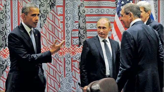  ?? MIKHAIL KLIMENTIEV/RIA NOVOSTI/K / EFE ?? Obama y Putin, junto a los responsabl­es de Exteriores ruso y norteameri­cano, Lavrov y Kerry, en la sede de las Naciones Unidas