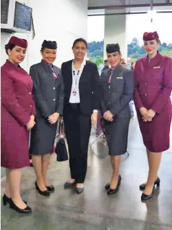  ??  ?? DOT XI Regional Director Tanya R. Tan meets the Qatar Airways Crew at the Francisco Bangoy Internatio­nal Airport