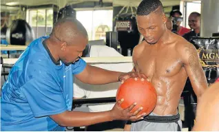  ??  ?? FINE-TUNING: Phumzile Matyhila was in charge when Zolani Tete set a new world record of the fastest knockout when he downed Siboniso Gonya in November last year