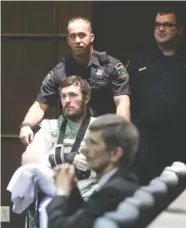  ?? STAFF PHOTO BY ERIN O. SMITH ?? Defendant Zane Campbell is pushed into the courtroom for his extraditio­n hearing Thursday at the Hamilton County Criminal Courthouse. Campbell has been recovering at Erlanger Health System since he was shot in April.