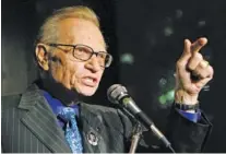  ?? AP PHOTO/STUART RAMSON ?? Larry King speaks to guests at a party held by CNN celebratin­g King’s 50 years of broadcasti­ng in New York in 2007.