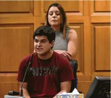  ??  ?? Anthony Medrano, 17, gives a victim impact statement on the death of his 6-year-old brother, Joshua, as his mother, Cynthia, offers moral support.