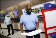  ?? JOHN MINCHILLO - ASSOCIATED PRESS ?? Jamaal Bowman votes at a polling station inside Yonkers Middle/High School on Tuesday in Yonkers, N.Y. Bowman is running against veteran Rep. Eliot Engel in the Democratic primary for New York’s 16th Congressio­nal District.