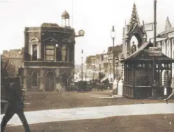  ??  ?? Left, Jubilee Square pictured in 1938, showing the soon to disappear main entrance at the front of the town hall and, right, Maidstone High Street as it was 50 years ago, in September 1969