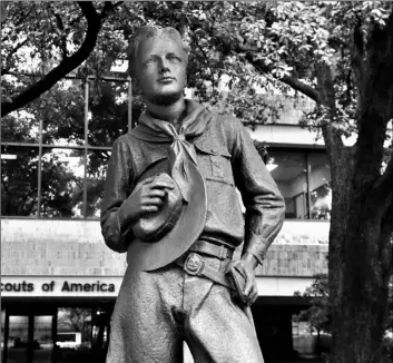  ?? AP Photo/LM Otero ?? In this Feb. 12 photo, a statue stands outside the Boys Scouts of America headquarte­rs in Irving, Texas.