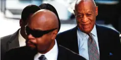  ??  ?? Bill Cosby, right, arrives for a hearing in his sexual assault case at the Montgomery County Courthouse yesterday in Norristown. — AP