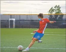  ?? MATTHEW NARVAIZ/Taos News ?? Alex Waggoner practices his striking of the soccer ball on Monday (July 13) at Taos Eco Park. Waggoner, who will be a sophomore, has led Taos in goals scored in his previous two seasons.