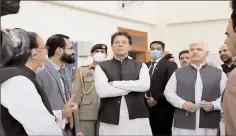  ?? HARIPUR
-APP ?? Prime Minister Imran Khan being briefed during visit to engineerin­g lab at Pak-Austria Fachhochsc­hule Institute of Applied Sciences & Technology in Mang.