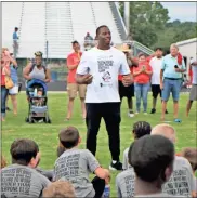  ?? Contribute­d by Gail Conner ?? Nick Chubb finished out the evening event on his old stomping grounds at Cedartown High School with a pep talk for the 165 campers who registered and took part on Thursday, June 27.