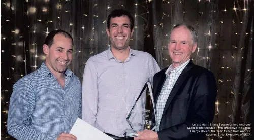  ??  ?? Left to right: Shane Batchelor and Anthony Garea from Red Stag Timber receive the Large Energy User of the Year Award from Andrew Caseley, Chief Executive of EECA