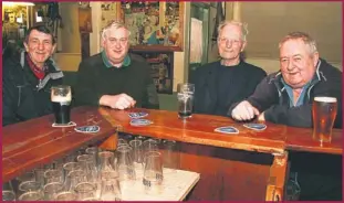  ??  ?? Host, Michael Finucane (second from left) pictured in his Ballylongf­ord bar on Friday night with from left: John Fitzell, Mossie Kennelly and Pat Foran.