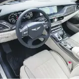  ?? GENESIS ?? The G90’s exposed surfaces are covered in premium leather along with tasteful touches of wood and aluminum trim.