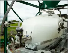  ?? ?? Granular urea is loaded onto the Tow and Fert machine where it is dissolved in water before being applied to the fields